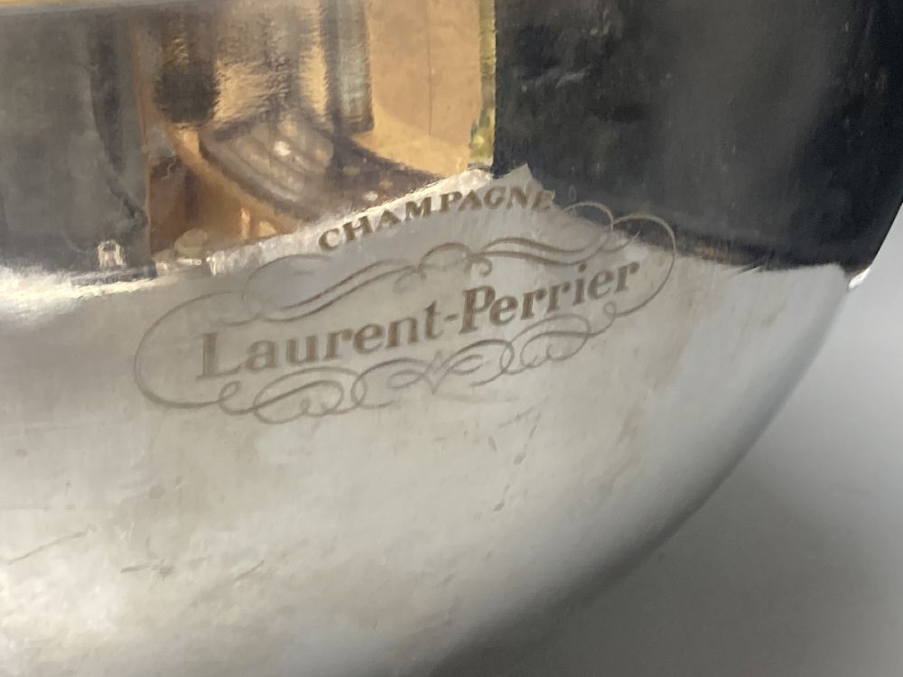 A large Laurent Perrier silver plated ice bucket, 41cm diameter, 25cm high